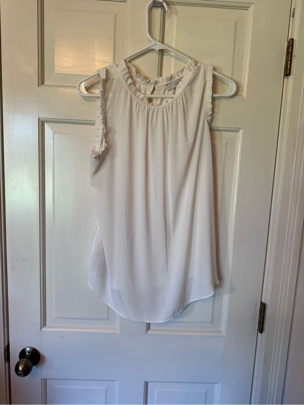 Women's White Ruffle Trim Sleeveless Blouse